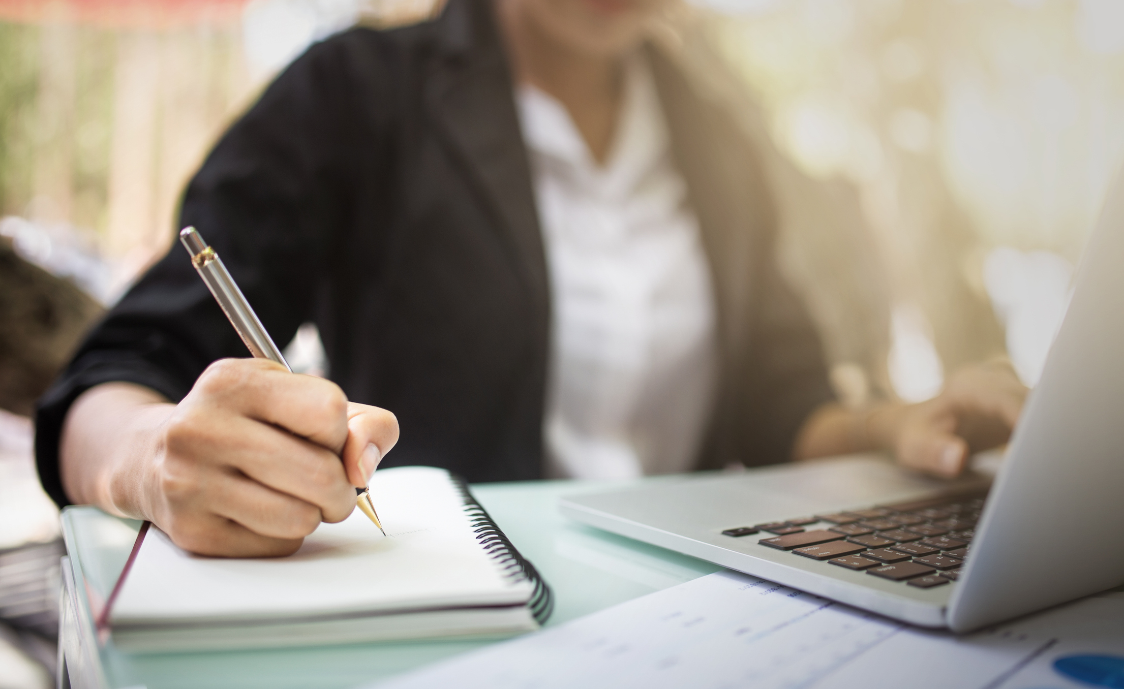 People using phones and laptops for online learning